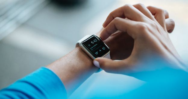looking at fitness tracker